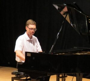 אלכסנדר מינולין מורה לפסנתר